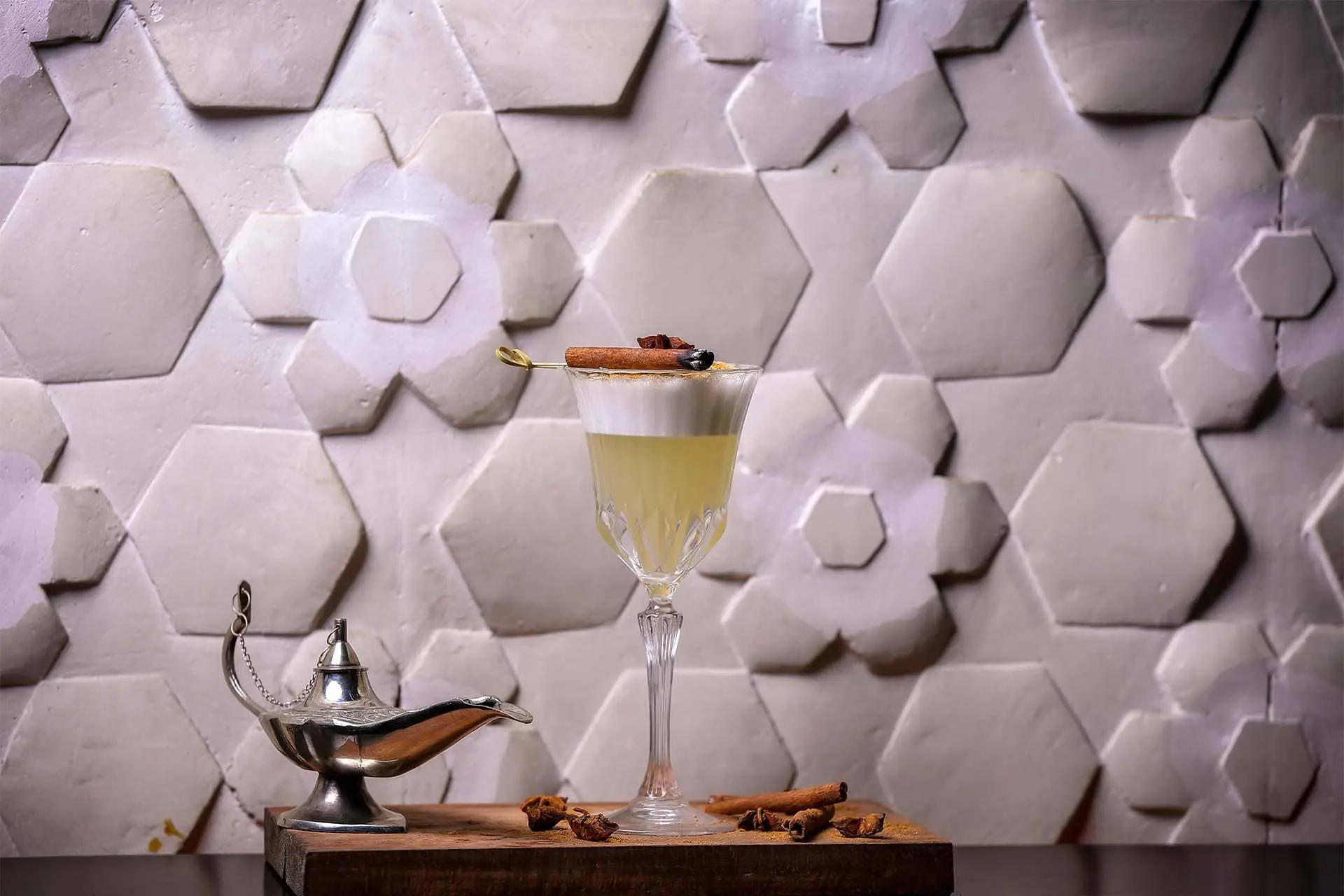 Cocktail against tadelakt wall